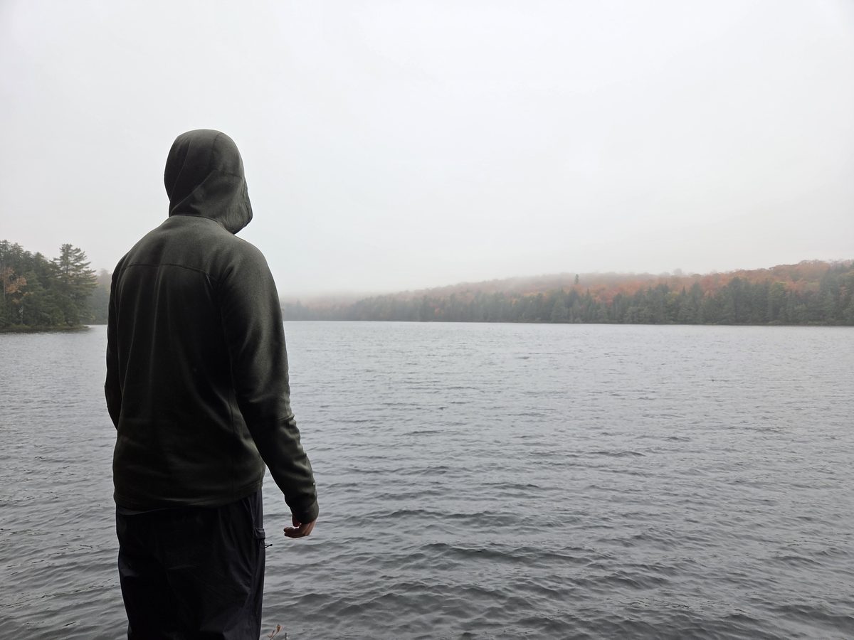 Zach by a lake in the Haliburton Highlands in autumn